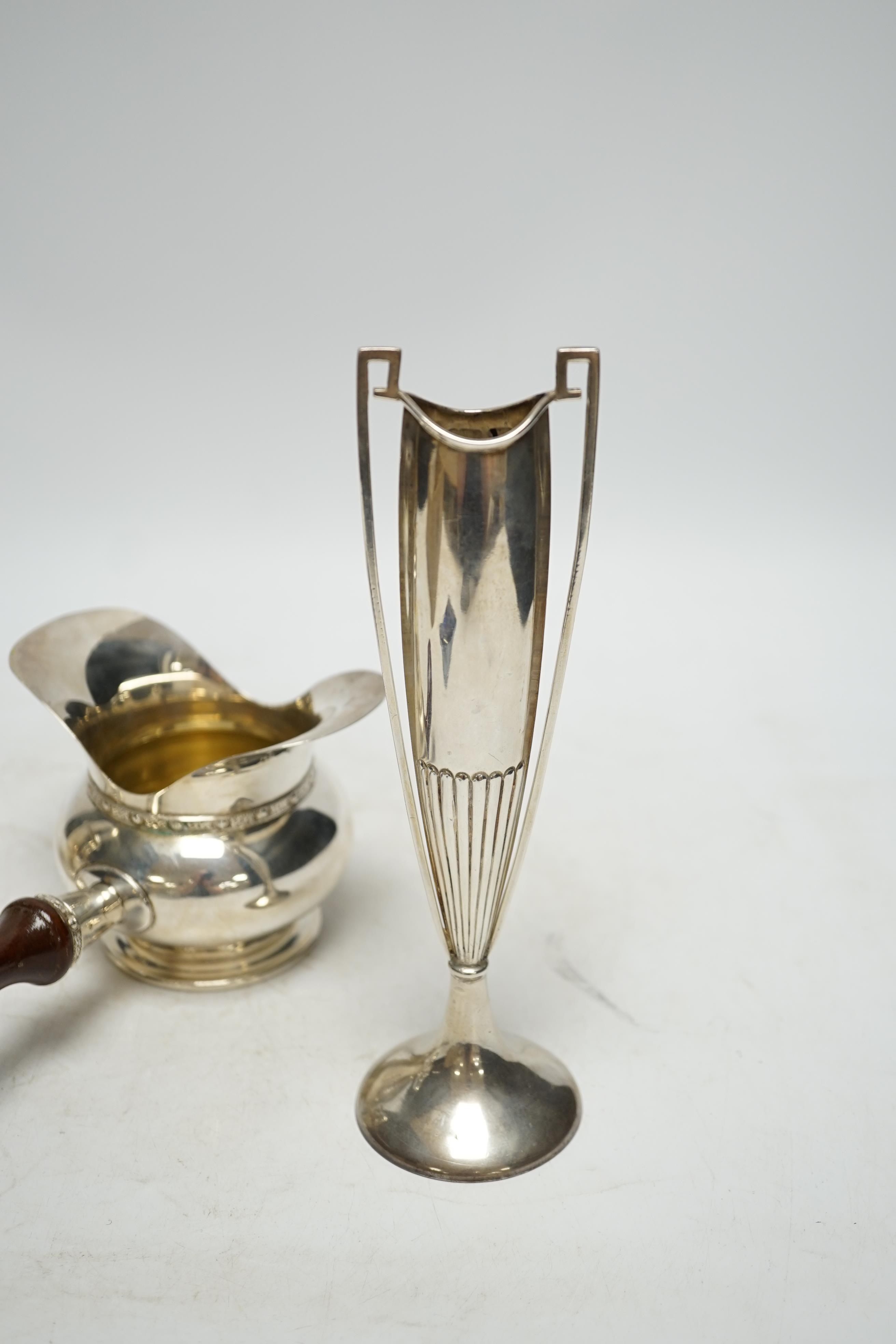 An Art Nouveau silver two handled posy vase, Birmingham, 1912, 19.9cm, a Victorian silver sugar caster and a modern silver double lipped pan. Condition - fair